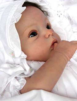 Reborn baby boy dressed in blue